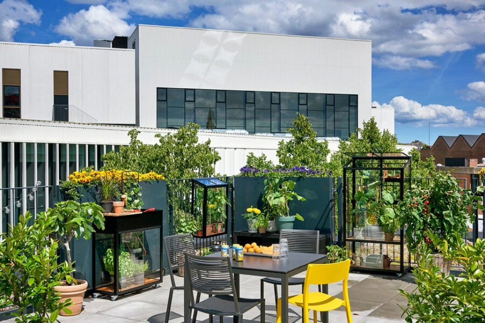 Kleine Paradiese – Dachterrasse mit Kräuterbeeten und Dining